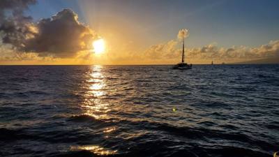 Sunset Cruise before dinner. Great way to end the day. Had some good whale watching and got to see Diamond Head from the