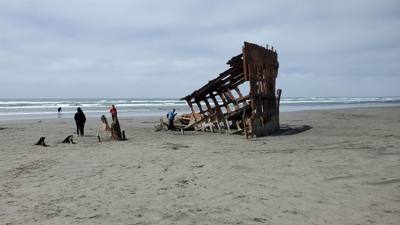 Interesting stop. This beach has a ship under it with parts poking out. Oh yeah, it's like 52 degrees and Oregonians a