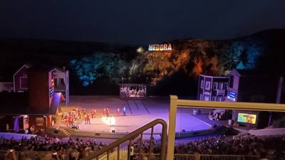 Medora Musical tonight.  Gotta love the backdrop behind all of this.  What a fantastic venue!  Avery is having fun.