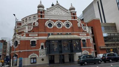 Passed in front of the opera house in Belfast.