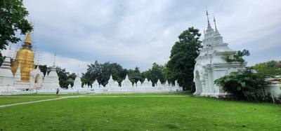 Reliquaries of Northern Thai Royalty.  Tour guide Udom explained the sticks against the tree and other things.  I sugges