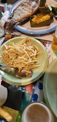 Lunch today was out in the boonies. The fish was delicious. So was the chicken. Dessert was a banana cake if some sor