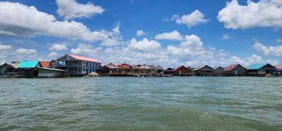 Second stop on the Phuket Island hopping tour was Koh Panyee village. We got off of our larger boat for a smaller more