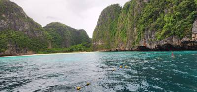 First, second and third stops today were on Phi Phi Lay Island.  Swimming, monkeys and snorkeling.  The swim cove was be