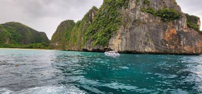 First, second and third stops today were on Phi Phi Lay Island.  Swimming, monkeys and snorkeling.  The swim cove was be