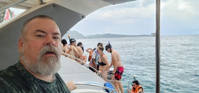 First, second and third stops today were on Phi Phi Lay Island. Swimming, monkeys and snorkeling. The swim cove was be