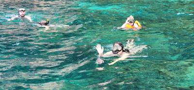 First, second and third stops today were on Phi Phi Lay Island. Swimming, monkeys and snorkeling. The swim cove was be
