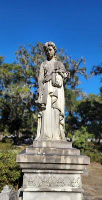 Yep, we're back in the cemeteries.  The age and wear on some of the headstones already makes it kinda creepy and beautif