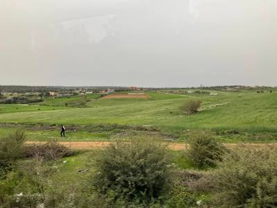 The Moroccan countryside outside of Rabat is mostly flat with some areas of  rolling hills.  Two things you see a lot wh