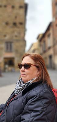 Our travel planner extraordinaire in Piazza del Salvatore, Lucca, Italy.
