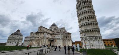 Wow!  Pisa!  You get off the train and walk a path through shops, cafes, larger restaurants, town squares and then cross