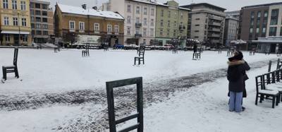 64 chairs.  One for each 1000 of the 64,000 residents of the Jewish ghetto in Krakow, Poland.
